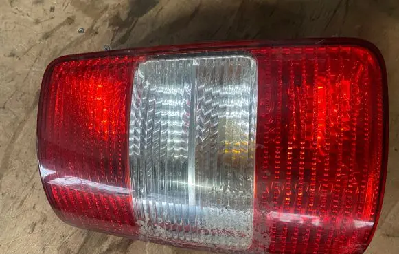 Volkswagen Caddy Rear/tail lights 2K0945111A