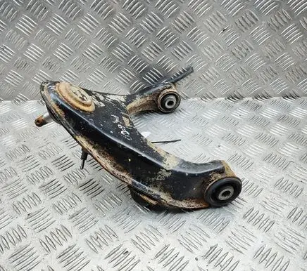 Mitsubishi L200 Front lower control arm/wishbone 4010A147
