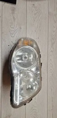 Chrysler Grand Voyager IV Headlight/headlamp 04857830AC