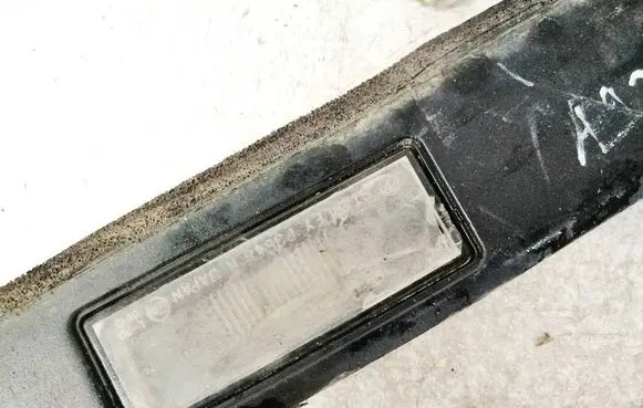 Subaru Legacy Number plate light p3548