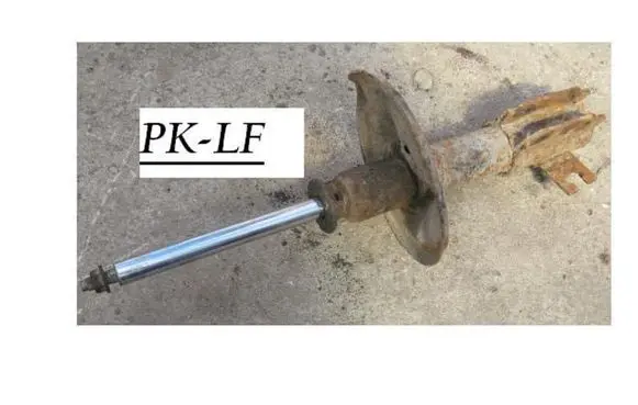 Mazda 323 Front shock absorber/damper 43346121