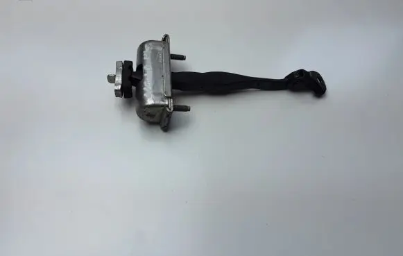 Front door check strap stopper