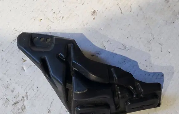 Opel Corsa F Fender mounting bracket 9823212980