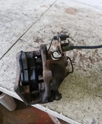Volkswagen PASSAT B5 Front brake caliper