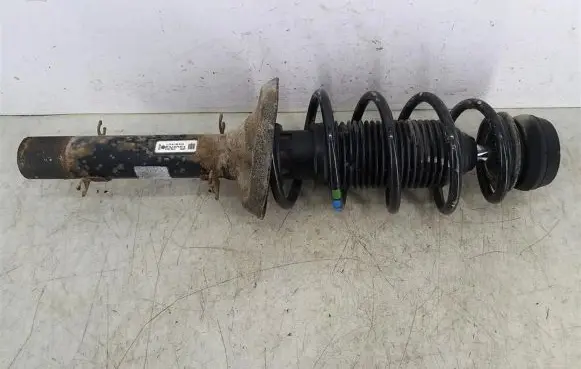 Volkswagen Golf IV Front shock absorber with coil spring 1J0413031S