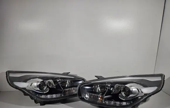 KIA Carens III Headlights/headlamps set 10387650348543
