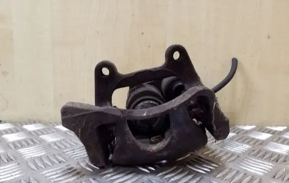 Volkswagen PASSAT B7 Rear brake caliper 1K0501530C