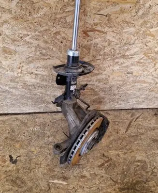 Front wheel hub spindle knuckle