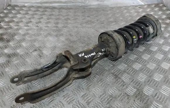 Volkswagen Touareg II Front shock absorber with coil spring
