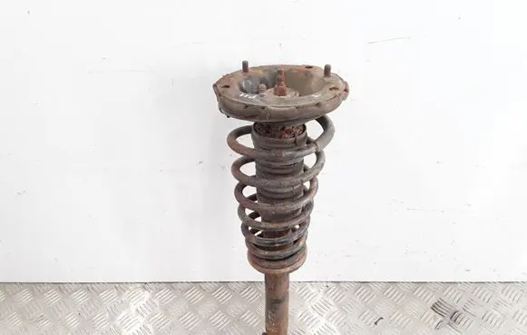 Nissan Primera Front shock absorber with coil spring