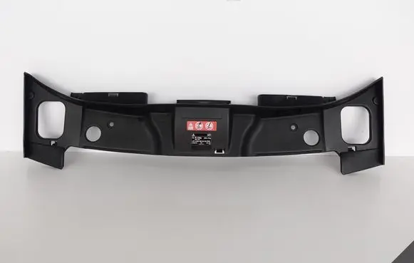 Engine bonnet/hood lock trim molding