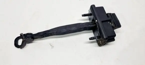 Front door check strap stopper