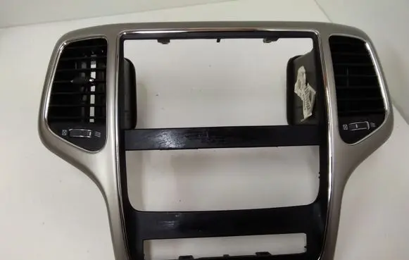 Jeep Grand Cherokee Radio/GPS head unit trim 00007409 00007408