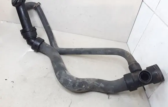 Volkswagen PASSAT B5.5 Engine coolant pipe/hose 038121121B 4B0121049S 06B121121