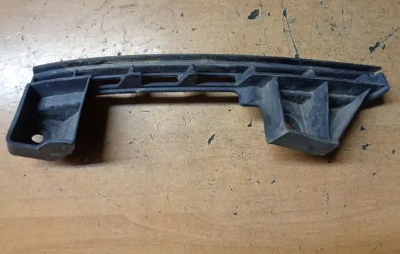Volkswagen Caddy Headlight/headlamp mounting bracket 1T0807890B