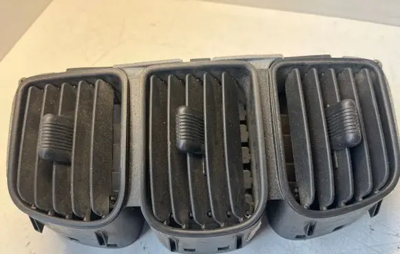 Dash center air vent grill