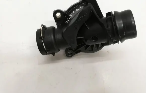 Thermostat/thermostat housing