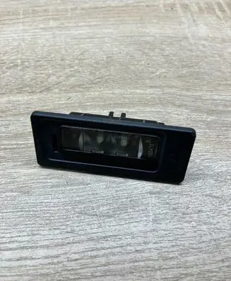 Volkswagen PASSAT B7 Number plate light 3AF943021A