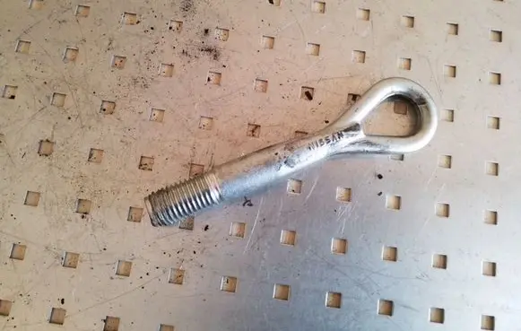 Towing hook eye