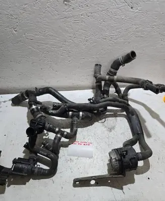 Engine coolant pipe/hose
