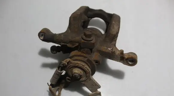 Opel Astra J Rear brake caliper