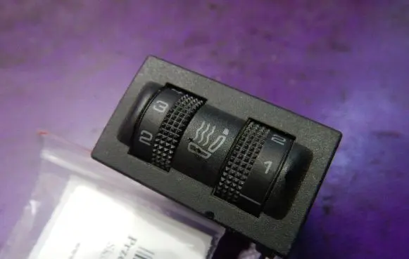 Seat heating switch