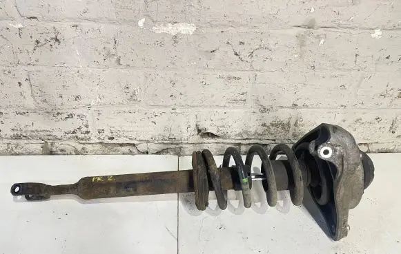 Audi A6 S6 C6 4F Front shock absorber with coil spring