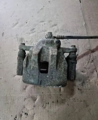 Suzuki Grand Vitara II Front brake caliper NOCODE