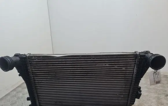 Volkswagen Touran I Intercooler radiator 1K0145803A