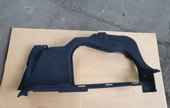Trunk/boot lower side trim panel
