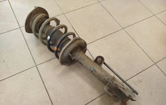 KIA Sorento Front shock absorber with coil spring 546502P500