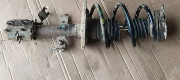 Renault Zoe Front shock absorber with coil spring 543027411R 543024644R