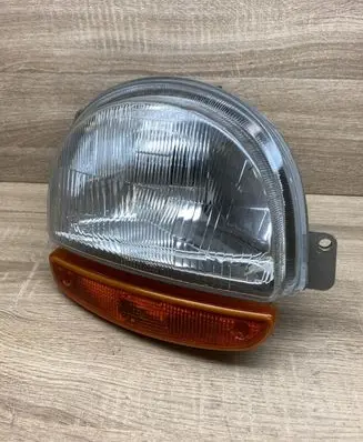 Renault Twingo I Headlight/headlamp 7701036392
