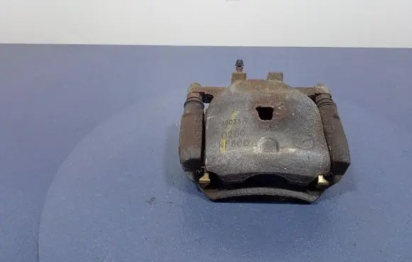 Mazda 3 II Front brake caliper