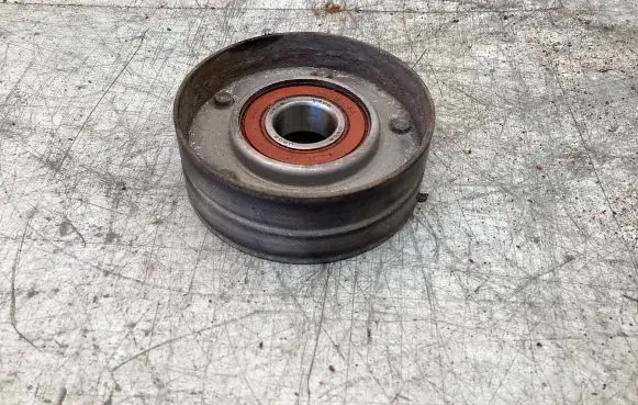 Opel Astra H Alternator belt tensioner 