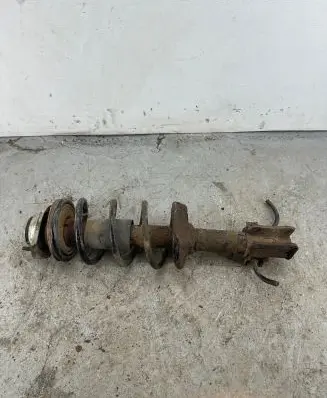 Subaru Justy Front shock absorber with coil spring 