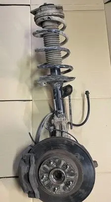 Nissan Qashqai Front shock absorber with coil spring 314038