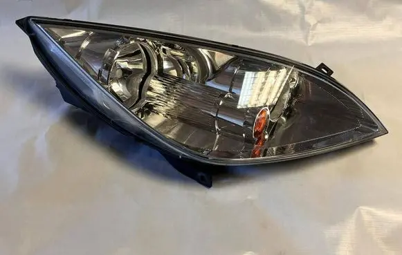 Mitsubishi Colt Headlight/headlamp MR957354 0301208202
