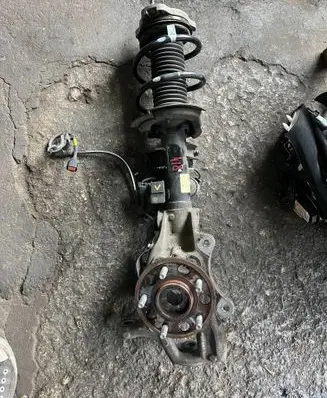 KIA Stinger Front shock absorber with coil spring 54650J5880
