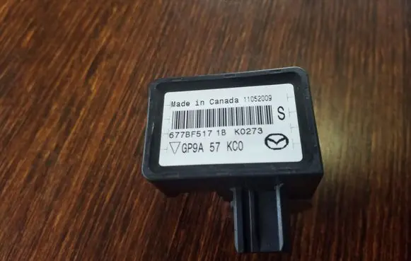 Mazda CX-7 Airbag deployment crash/impact sensor GP9A57KC0 677BF5171BK0273 11052009