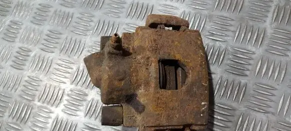 Mazda 121 Front brake caliper