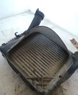 Volkswagen Touareg I Intercooler radiator 7L0117339
