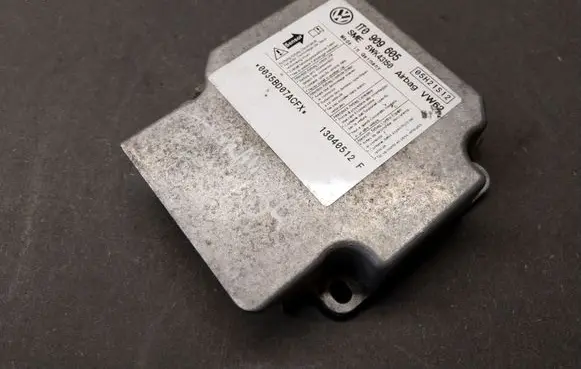 Volkswagen Touran I Airbag control unit/module 1T0909605