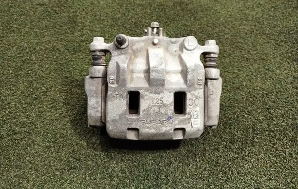 Subaru Outback (BT) Front brake caliper T25 0F00X
