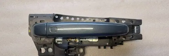 Rear door exterior handle/bracket
