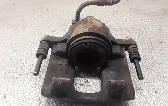 Chrysler Grand Voyager V Front brake caliper 