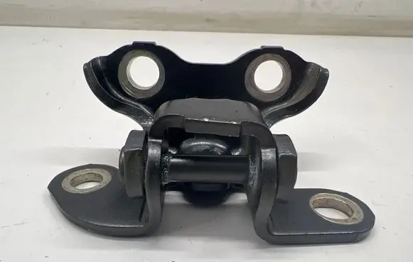 Rear door upper hinge