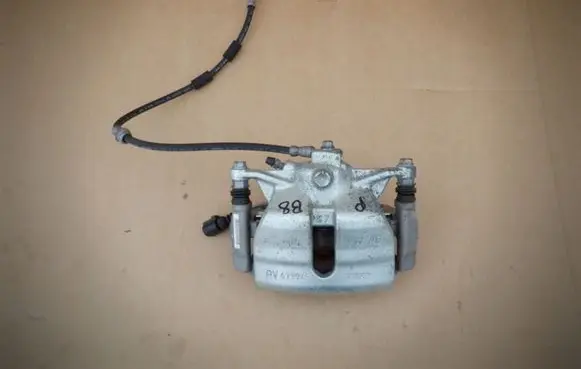 Volkswagen PASSAT B8 Front brake caliper 5Q0106DQ