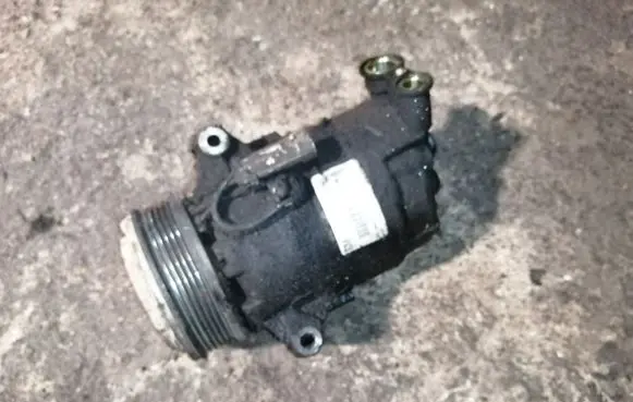 Opel Zafira B Air conditioning (A/C) compressor (pump) 13124752