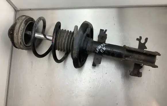 Renault Laguna III Front shock absorber with coil spring